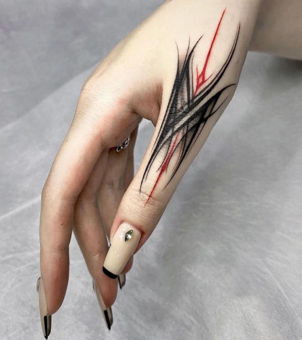 Abstract Art finger tattoo ideas