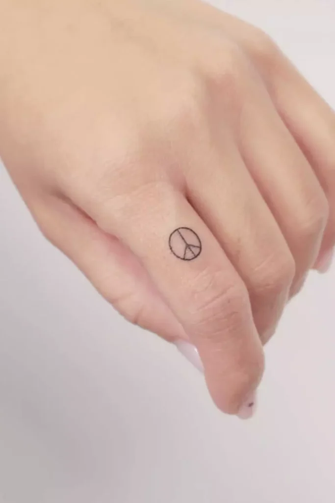 symbols and icons finger tattoo ideas